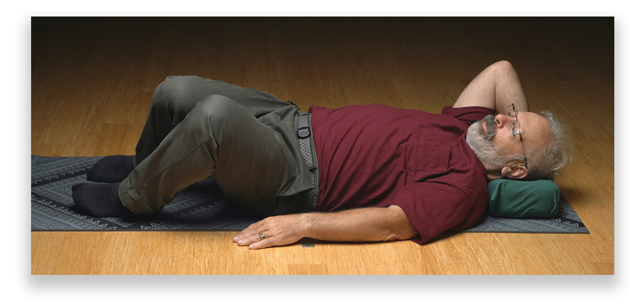 image of Eric Cooper doing gentle Somatics Sequence