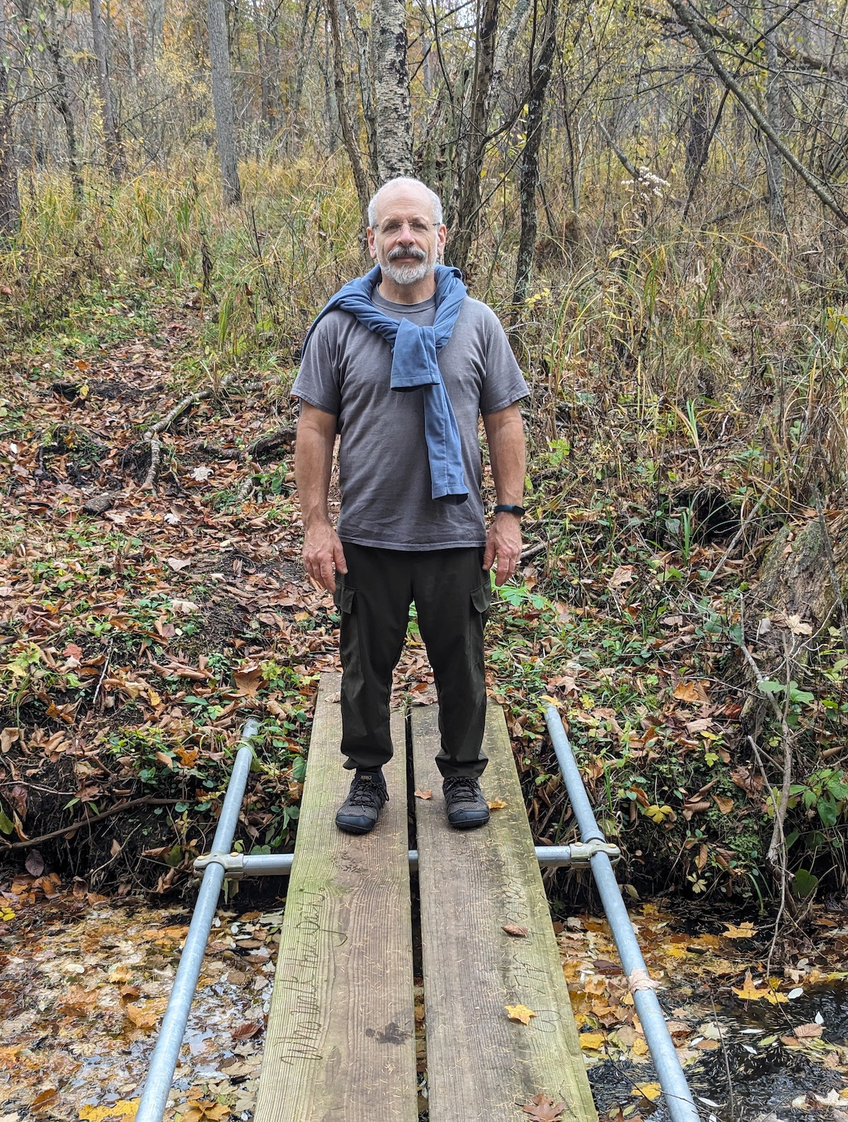 Eric Cooper on a bridge in nature